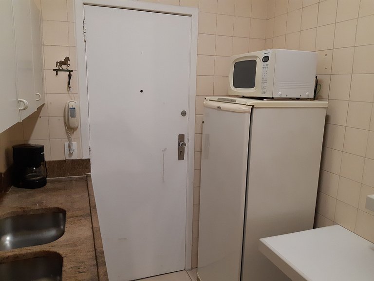 Charmoso apartamento a 1 quadra da praia